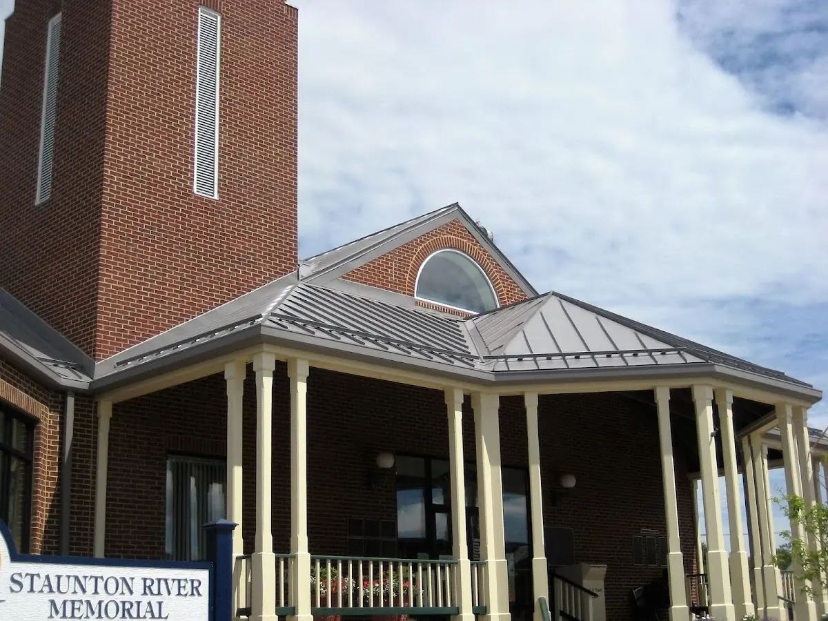 Skilled roofing craftsmen working on a residential roof in Rossville